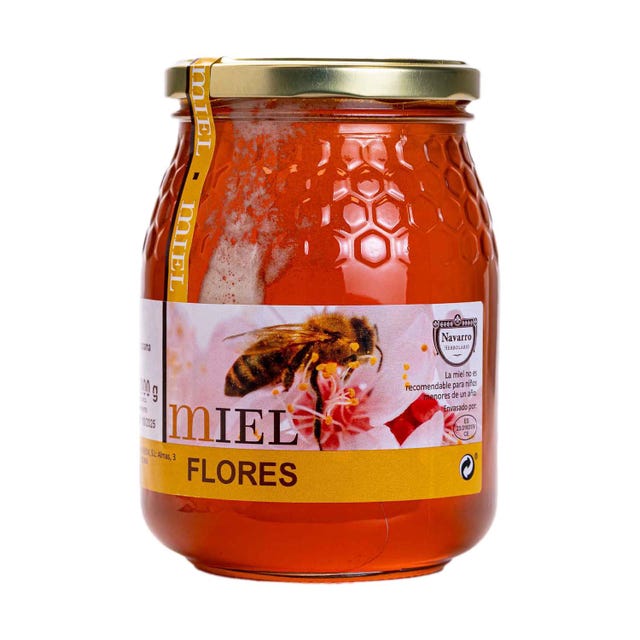 Vela esencial aroma miel en hojas Herbolario Navarro